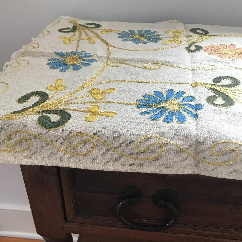 Decorative Turkish table runner with vibrant floral design.